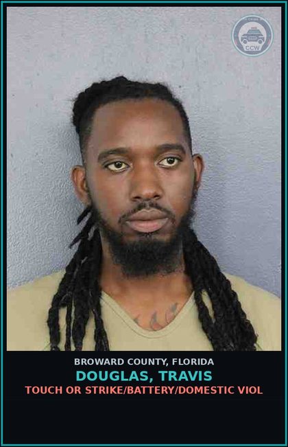 CCW arrest card for DOUGLAS, TRAVIS in Broward County: TOUCH OR STRIKE/BATTERY/DOMESTIC VIOL
