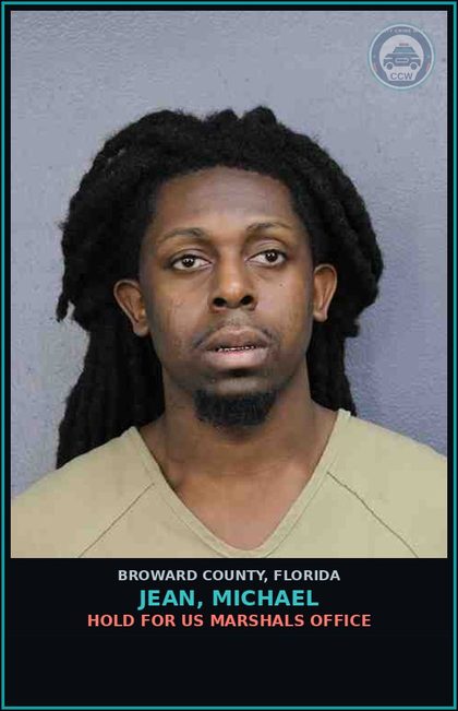 CCW arrest card for JEAN, MICHAEL in Broward County: HOLD FOR US MARSHALS OFFICE