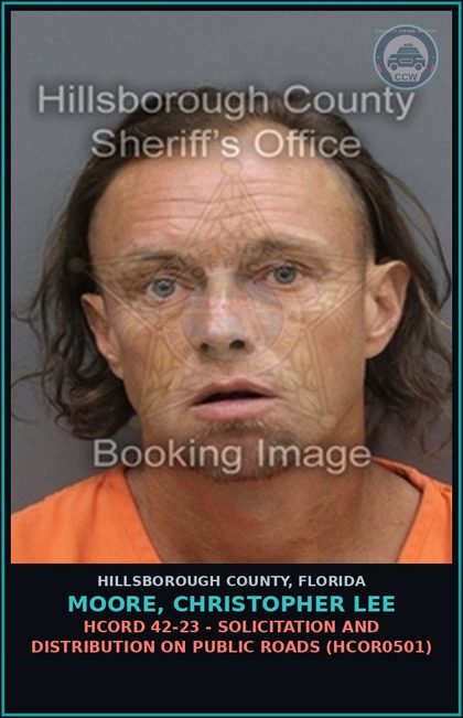 CCW arrest card for MOORE, CHRISTOPHER LEE in Hillsborough County: HCORD 42-23 - SOLICITATION AND DISTRIBUTION ON PUBLIC ROADS (HCOR0501)