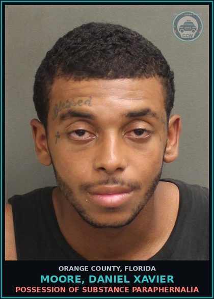 CCW arrest card for MOORE, DANIEL XAVIER in Orange County: SITTING/LYING ON SIDEWALKS IN THE DOWNTOWN CORE DISTRICT PROHIBITED