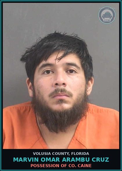 CCW arrest card for MARVIN OMAR ARAMBU CRUZ in Volusia County: POSSESSION OF CO. CAINE
