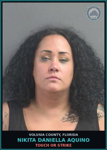CCW arrest card for NIKITA DANIELLA AQUINO in Volusia County: TOUCH OR STRIKE