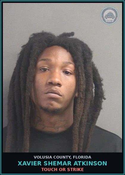 CCW arrest card for XAVIER SHEMAR ATKINSON in Volusia County: TOUCH OR STRIKE