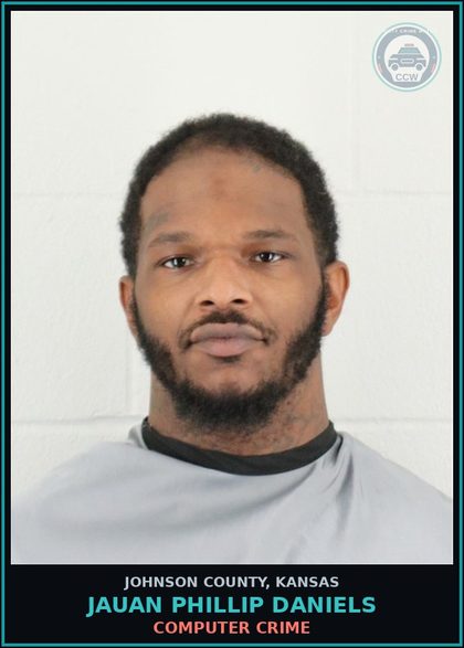 CCW arrest card for JAUAN PHILLIP DANIELS in Johnson County: COMPUTER CRIME