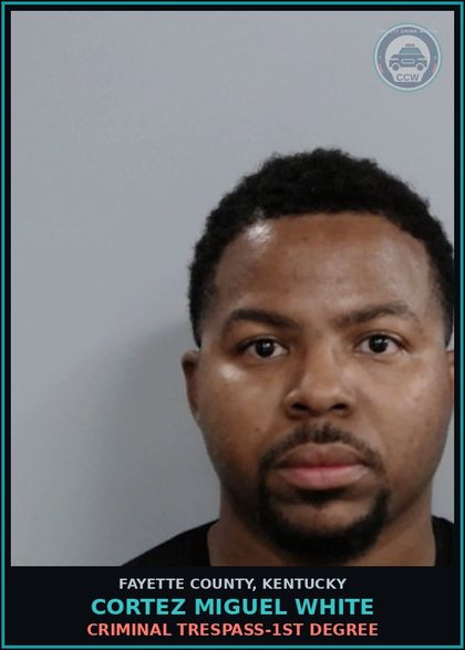 CCW arrest card for CORTEZ MIGUEL WHITE in Fayette County: CRIMINAL TRESPASS-1ST DEGREE