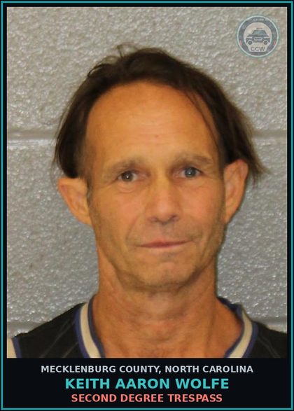 CCW arrest card for KEITH AARON WOLFE in Mecklenburg County: SECOND DEGREE TRESPASS