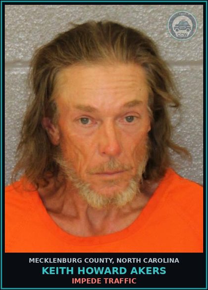 CCW arrest card for KEITH HOWARD AKERS in Mecklenburg County: IMPEDE TRAFFIC