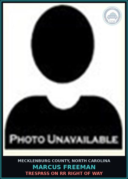 CCW arrest card for MARCUS FREEMAN in Mecklenburg County: TRESPASS ON RR RIGHT OF WAY