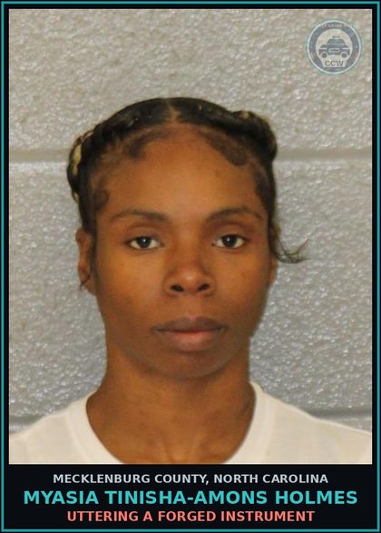 CCW arrest card for MYASIA TINISHA-AMONS HOLMES in Mecklenburg County: UTTERING A FORGED INSTRUMENT