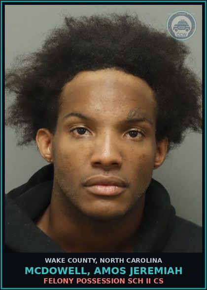 CCW arrest card for Mcdowell, Amos Jeremiah in Wake County: FELONY POSSESSION SCH II CS