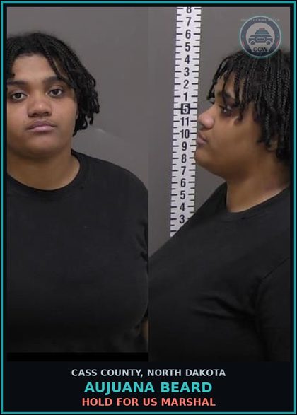 CCW arrest card for Aujuana Beard in Cass County: HOLD FOR US MARSHAL