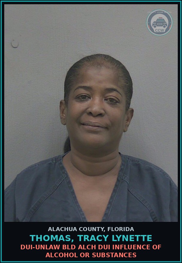 Booking mugshot of THOMAS, TRACY LYNETTE in Alachua County