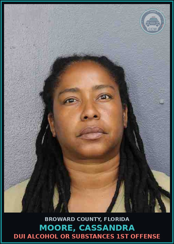 Booking mugshot of MOORE, CASSANDRA in Broward County
