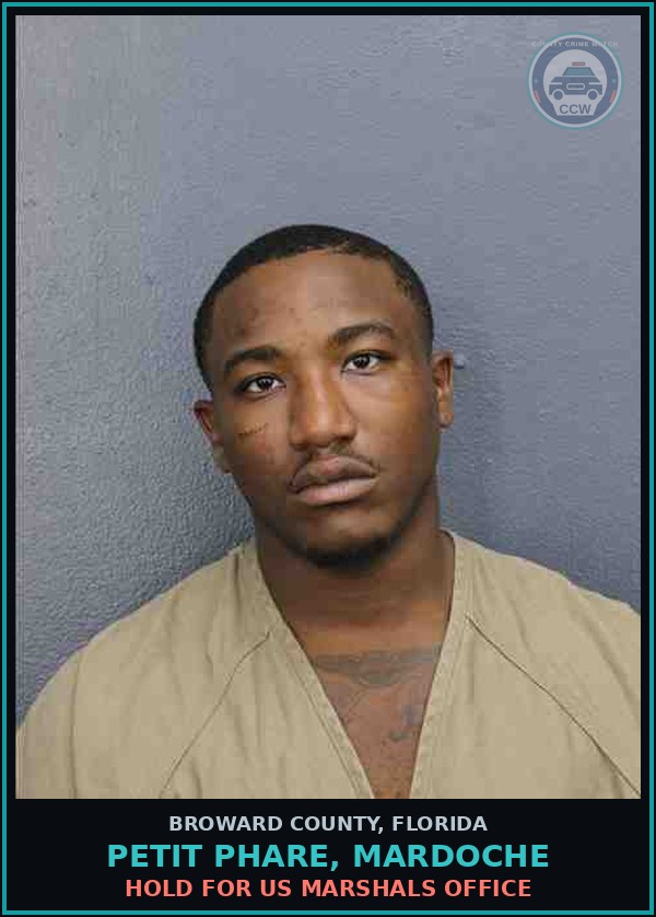 Booking mugshot of PETIT PHARE, MARDOCHE in Broward County