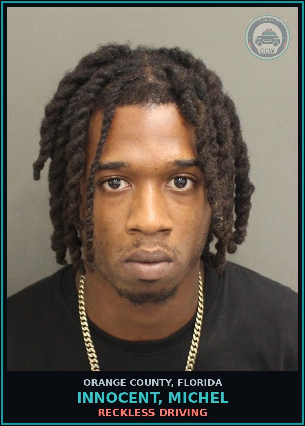 Booking mugshot of INNOCENT, MICHEL in Orange County