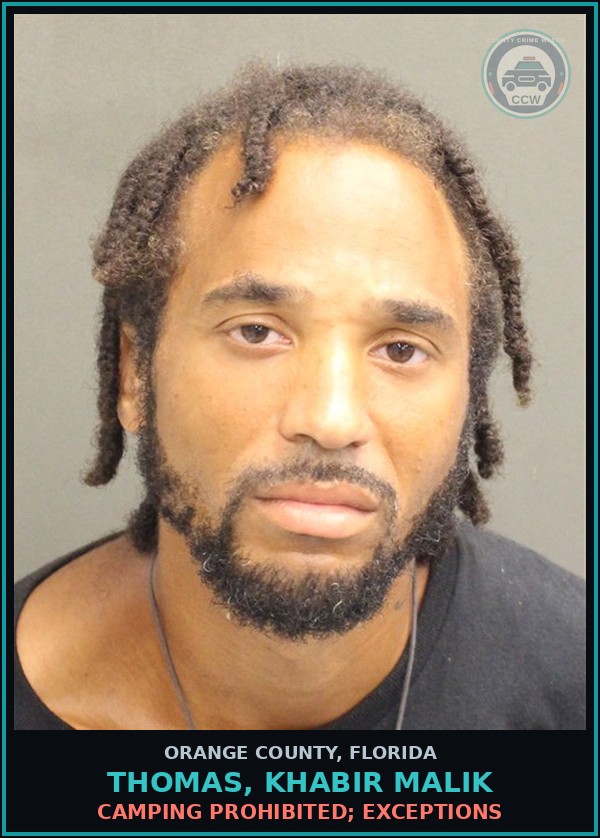 Booking mugshot of THOMAS, KHABIR MALIK in Orange County