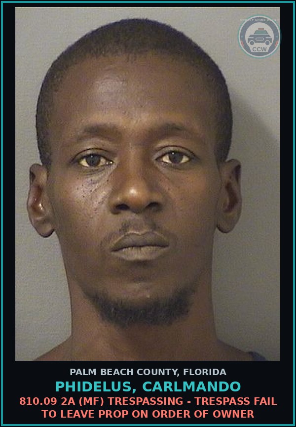 Booking mugshot of PHIDELUS, CARLMANDO in Palm Beach County
