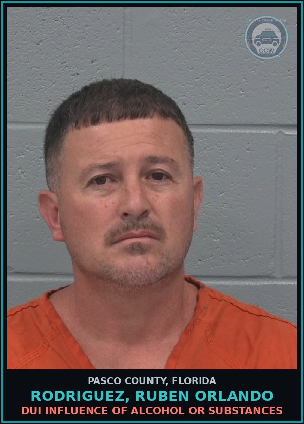 Booking mugshot of RODRIGUEZ, RUBEN ORLANDO in Pasco County