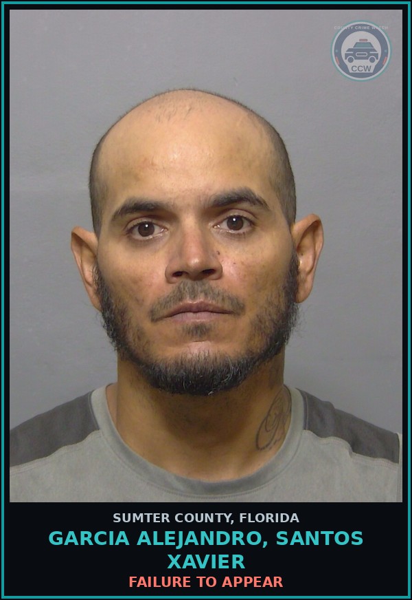 Booking mugshot of GARCIA ALEJANDRO, SANTOS XAVIER in Sumter County