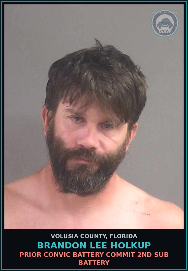 Booking mugshot of BRANDON LEE HOLKUP in Volusia County