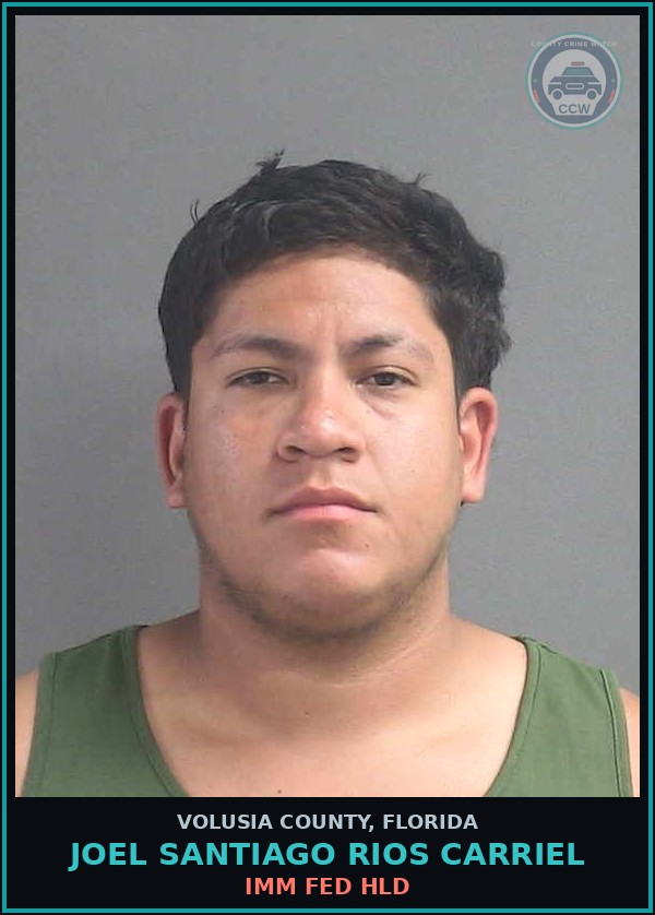 Booking mugshot of JOEL SANTIAGO RIOS CARRIEL in Volusia County