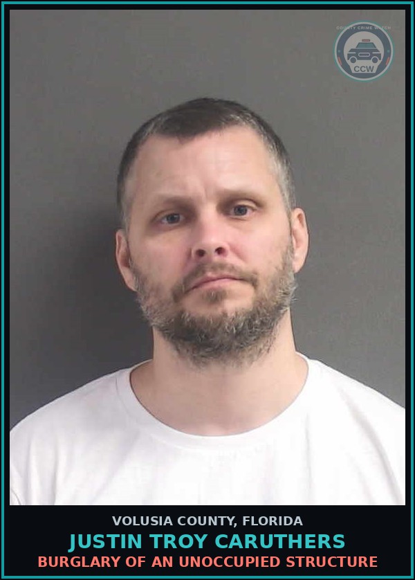 Booking mugshot of JUSTIN TROY CARUTHERS in Volusia County