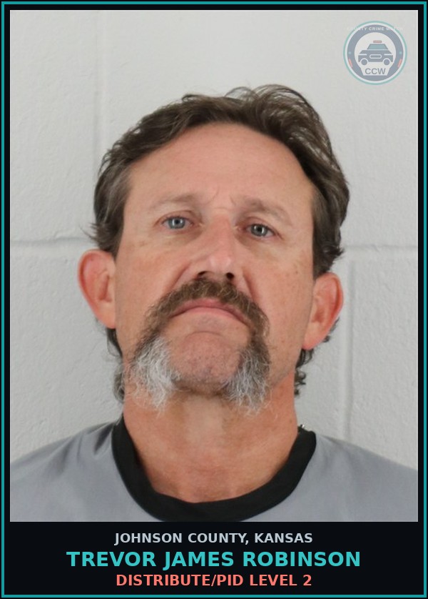 Booking mugshot of TREVOR JAMES ROBINSON in Johnson County