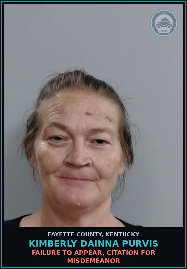 Booking mugshot of KIMBERLY DAINNA PURVIS in Fayette County