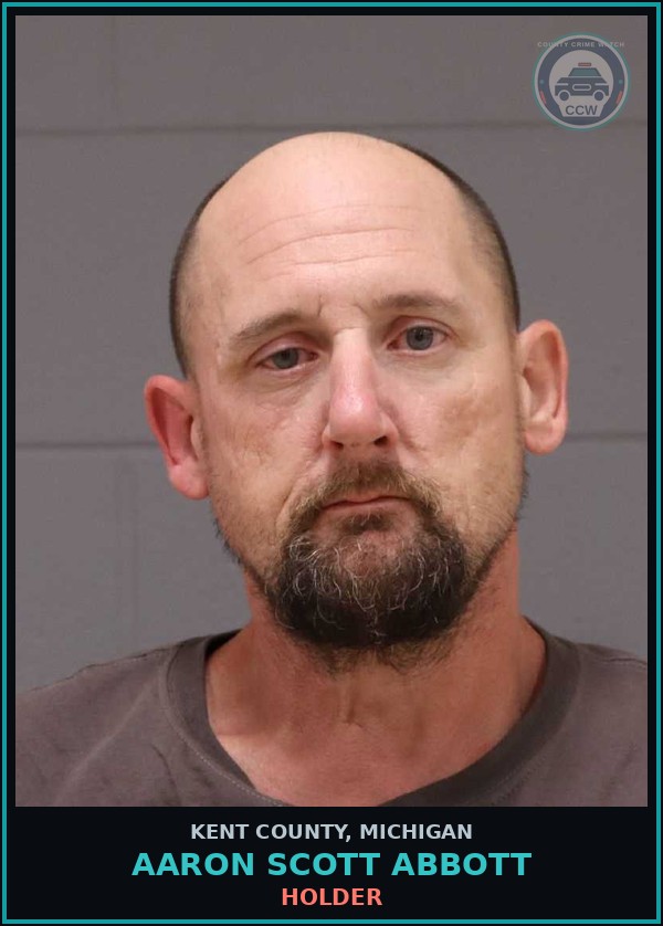 Booking mugshot of Aaron Scott Abbott in Kent County