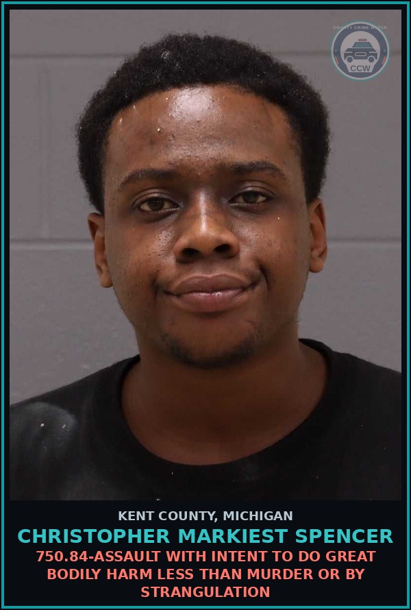 Booking mugshot of Christopher Markiest Spencer in Kent County