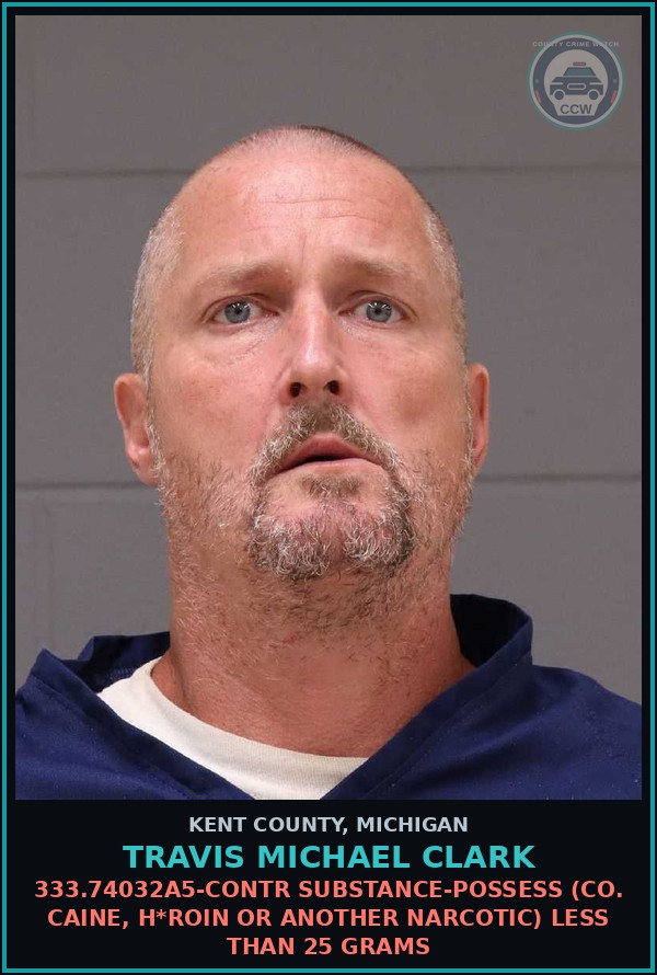 Booking mugshot of Travis Michael Clark in Kent County
