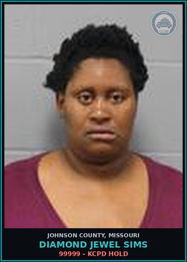 Booking mugshot of Diamond Jewel Sims in Johnson County