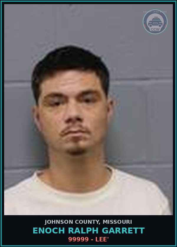 Booking mugshot of Enoch Ralph Garrett in Johnson County