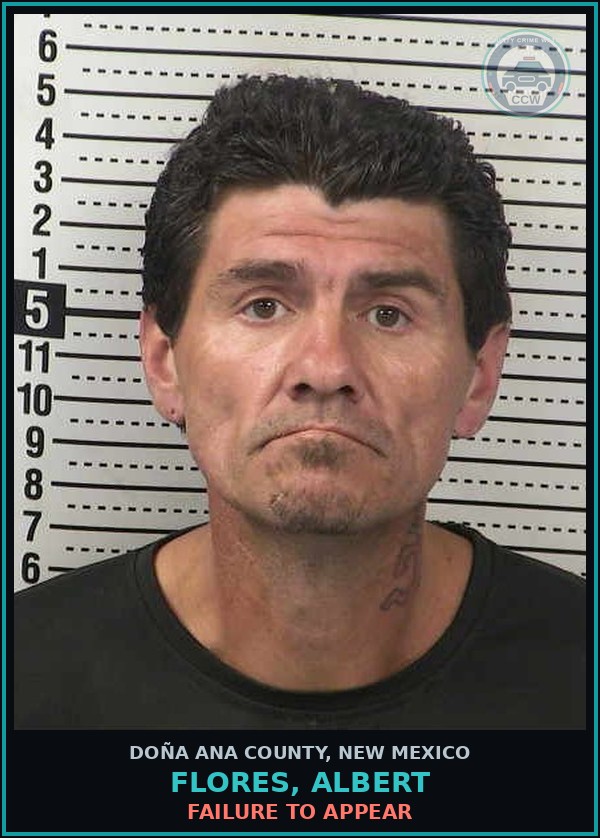 Booking mugshot of Flores, Albert in Doña Ana County