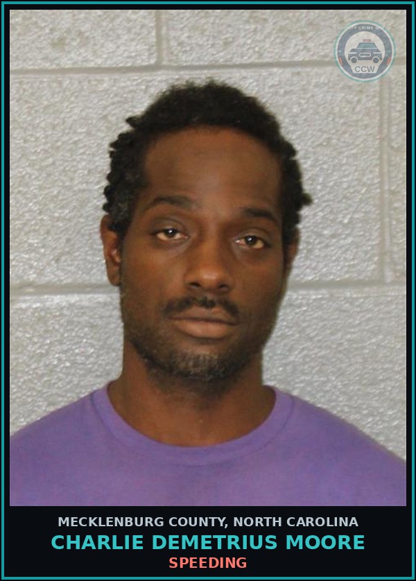 Booking mugshot of CHARLIE DEMETRIUS MOORE in Mecklenburg County