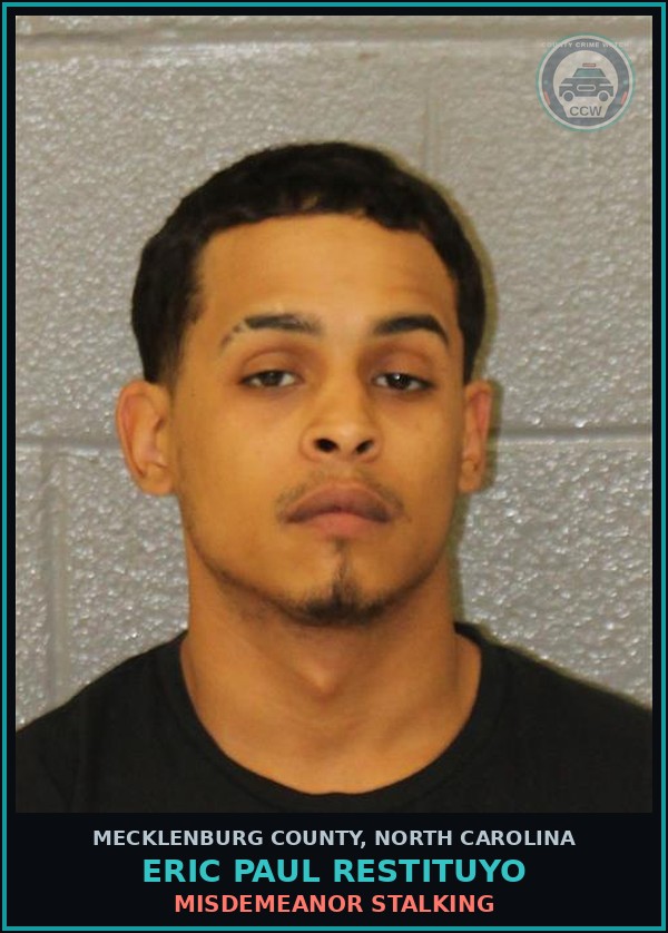 Booking mugshot of ERIC PAUL RESTITUYO in Mecklenburg County