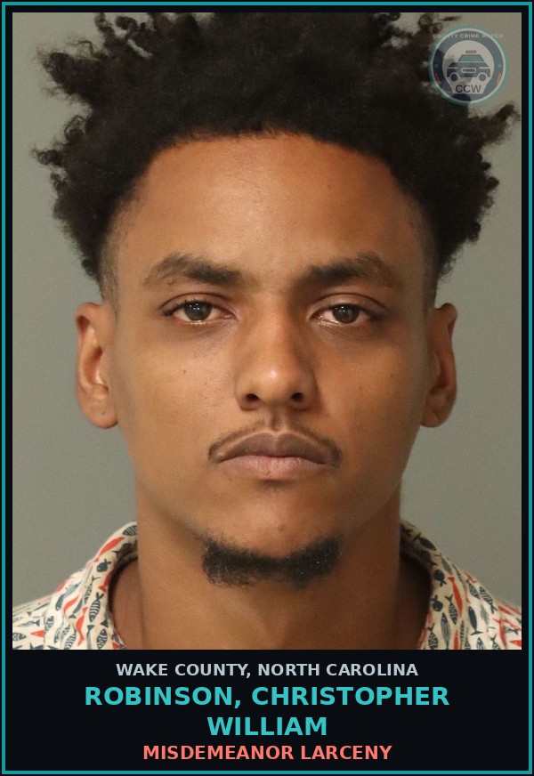 Booking mugshot of Robinson, Christopher William in Wake County
