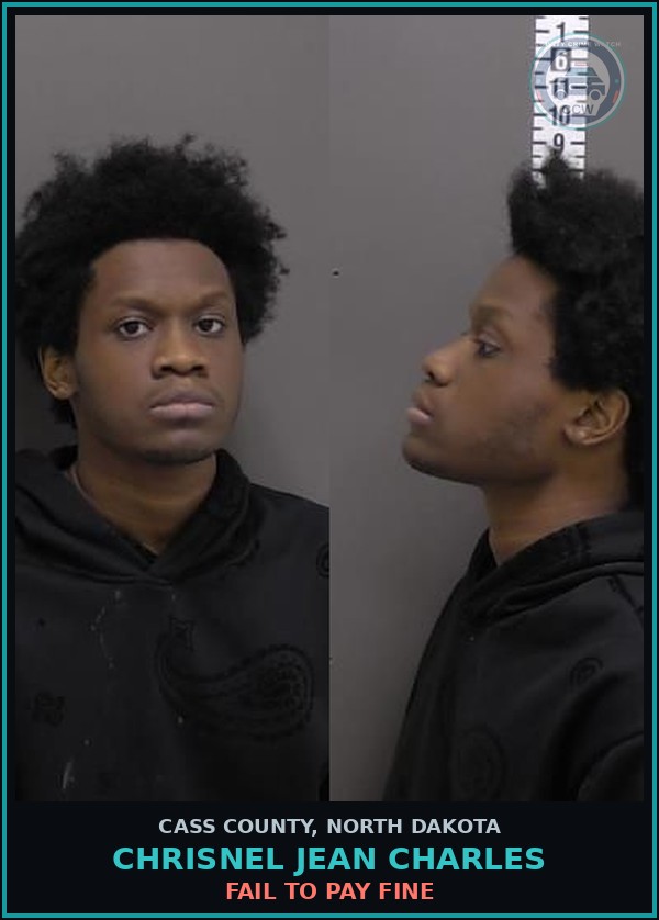 Booking mugshot of Chrisnel Jean Charles in Cass County