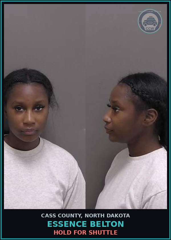 Booking mugshot of Essence Belton in Cass County