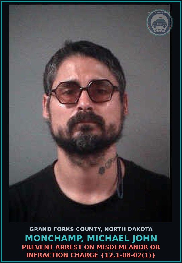 Booking mugshot of Monchamp, Michael John in Grand Forks County