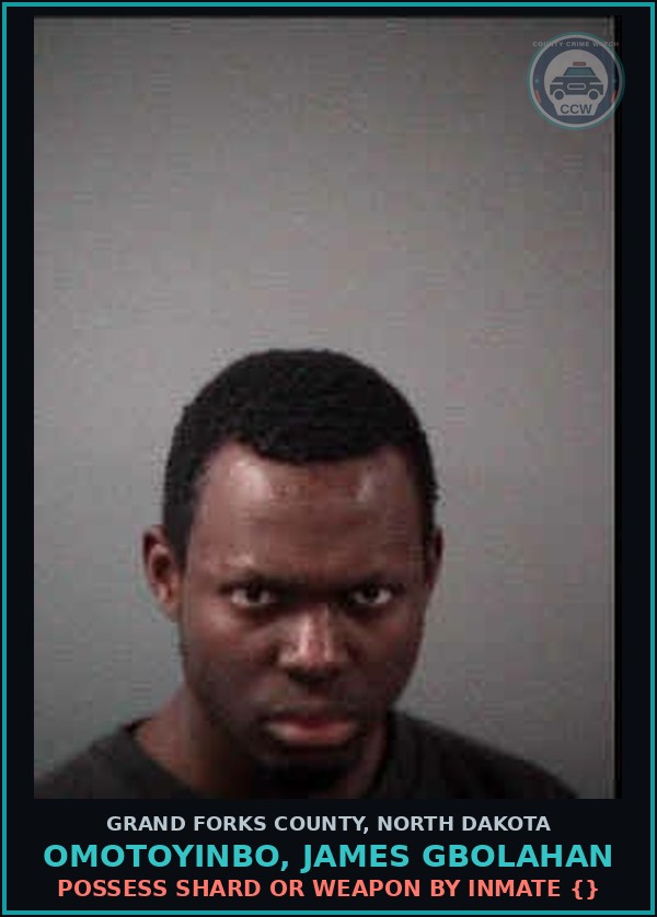 Booking mugshot of Omotoyinbo, James Gbolahan in Grand Forks County
