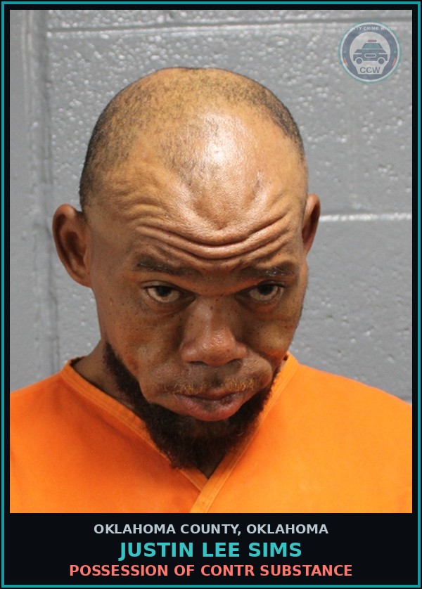 Booking mugshot of Justin Lee Sims in Oklahoma County