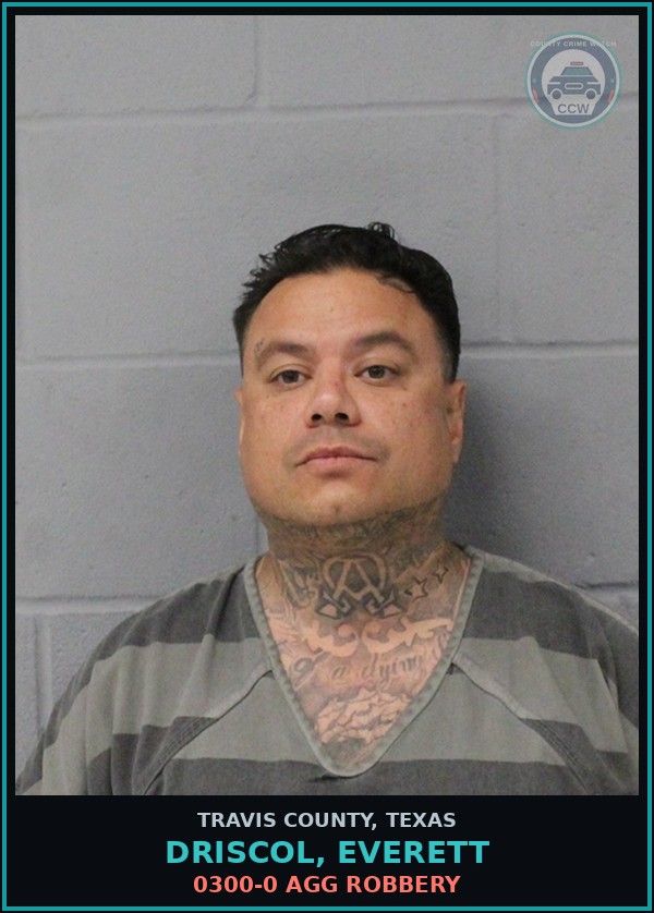 Booking mugshot of Driscol, Everett in Travis County